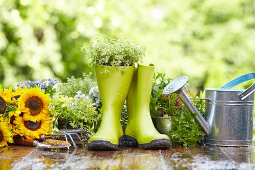 Professional gardeners working in a Graceville landscape