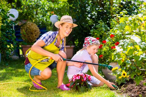 Local Brisbane gardeners maintaining a lush garden